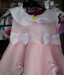 Платье праздничное розовое с белыми бантиками и красивым воротником